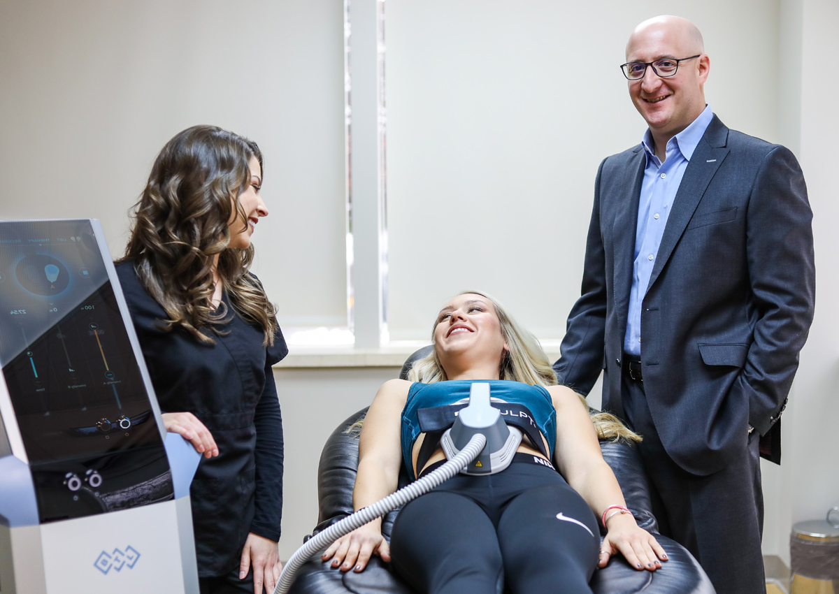 Dr. Waldman with a patient